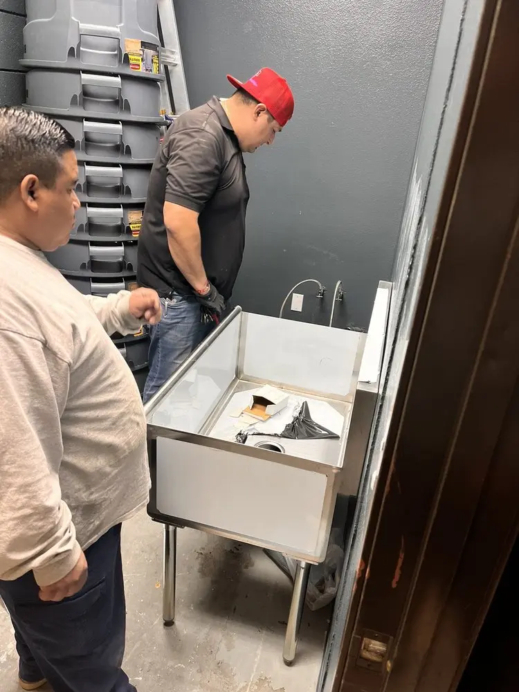 Commercial plumbing and sink installation in Onward